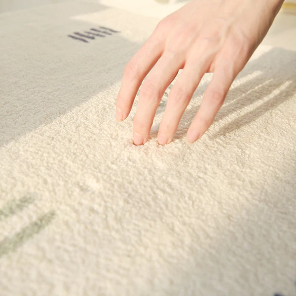 Tapis salon crème texturé moderne